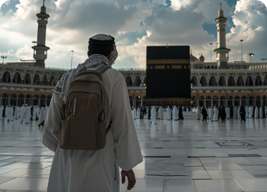 Man and kaaba in front of him